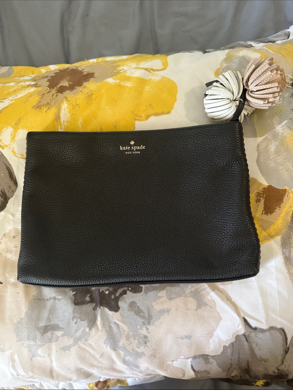 kate spade black pebbled leather pouch with gold logo